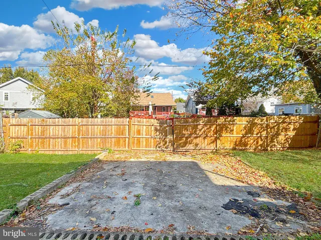 a view of a yard with an outdoor space