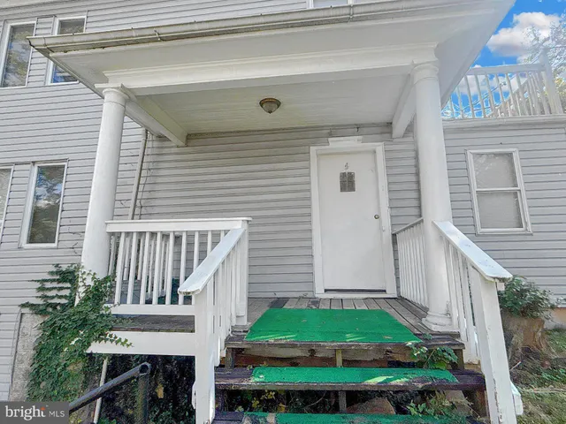 a view of a yard with an outdoor space