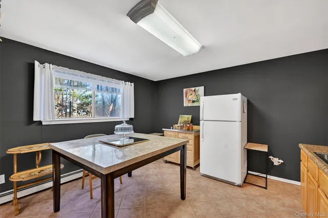 a workspace with furniture and a window