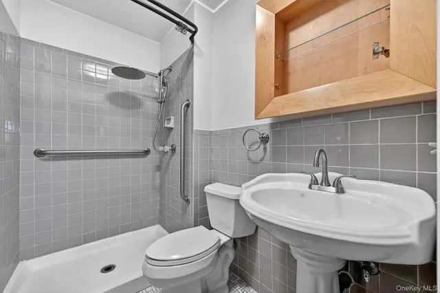a view of balcony with wooden floor and fence