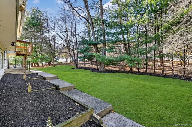 a house view with a garden space