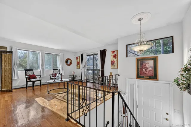 a view of a livingroom with furniture and window