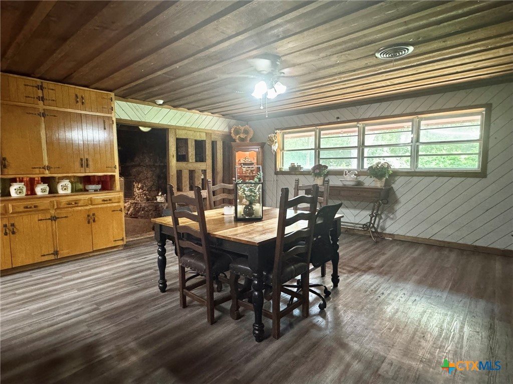 3221 West Ave R Temple, TX 76504 - Photo 19 of 48 a view of a dining room with furniture window and wooden floor