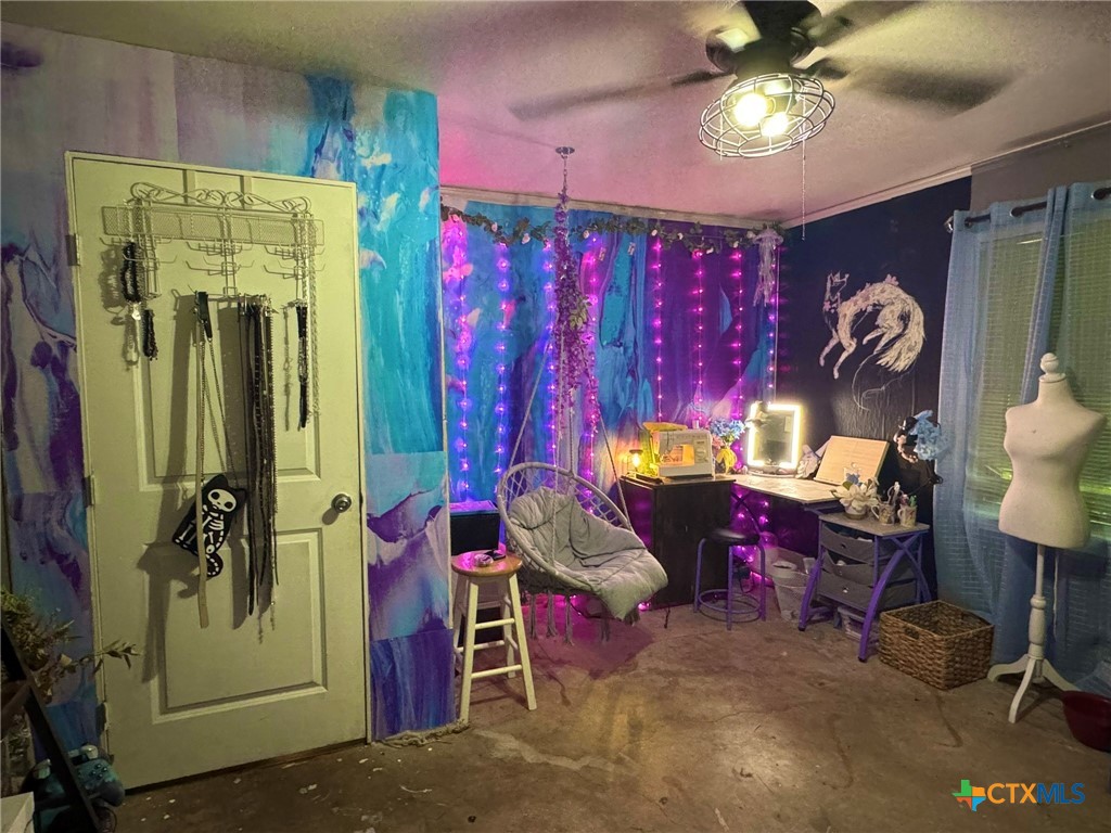 3221 West Ave R Temple, TX 76504 - Photo 22 of 48 a view of a room with gym equipment