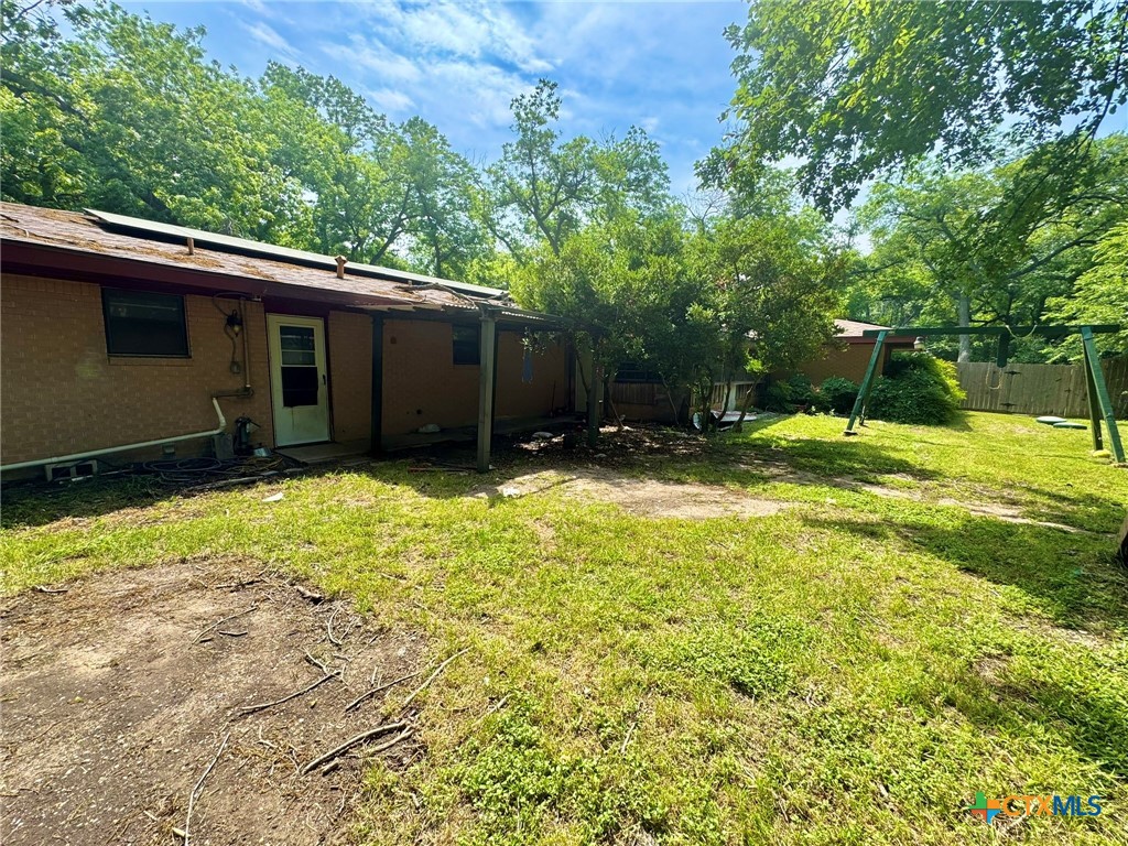 3221 West Ave R Temple, TX 76504 - Photo 36 of 48 a view of a backyard of the house