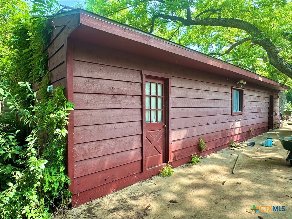 3221 West Ave R Temple, TX 76504 - Photo 37 of 48 a view of a house with a backyard
