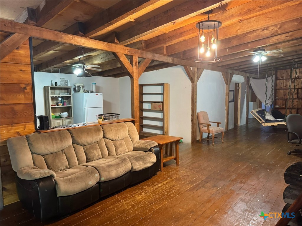 3221 West Ave R Temple, TX 76504 - Photo 43 of 48 a work room with furniture and a chandelier
