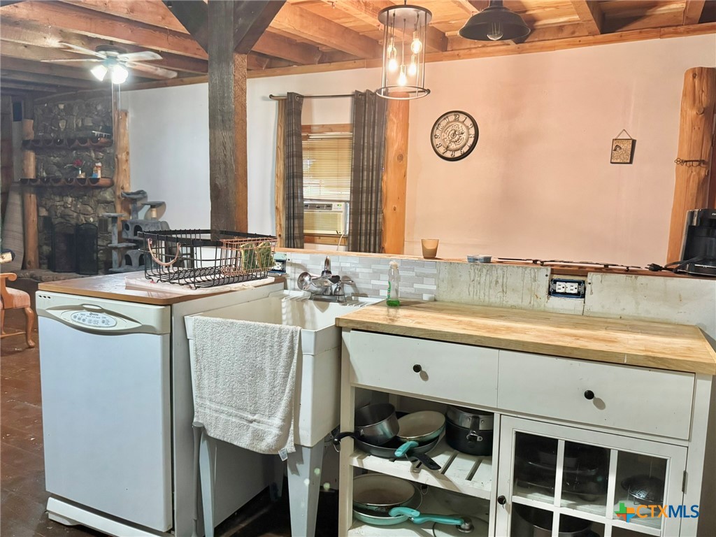 3221 West Ave R Temple, TX 76504 - Photo 44 of 48 a bathroom with a sink and a mirror