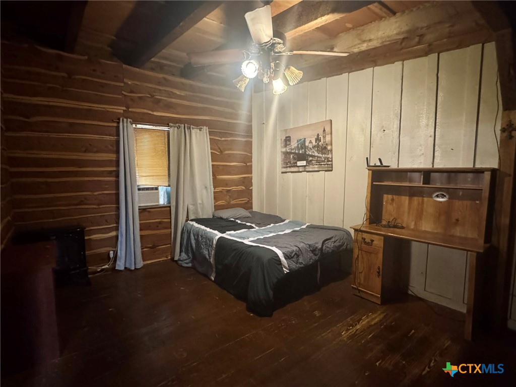 3221 West Ave R Temple, TX 76504 - Photo 48 of 48 a bed sitting in a bedroom next to a window