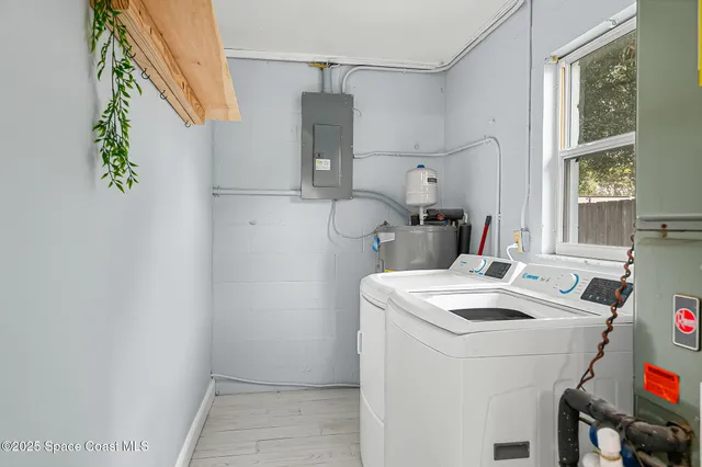 a view of a kitchen with furniture and a window