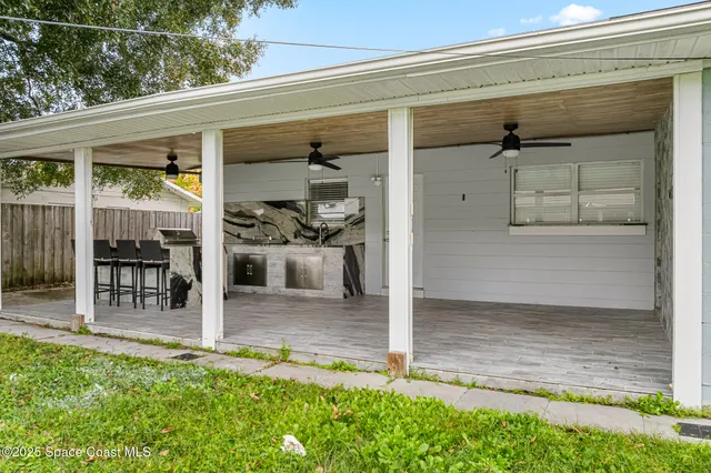a view of a backyard with a small cabin