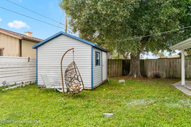 a view of a terrace with a garden