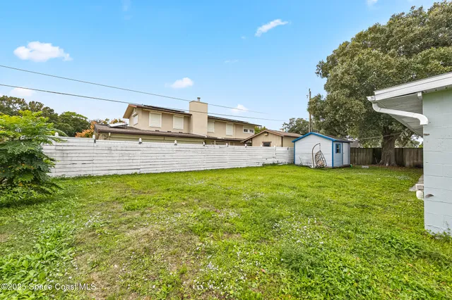 a view of backyard with green space