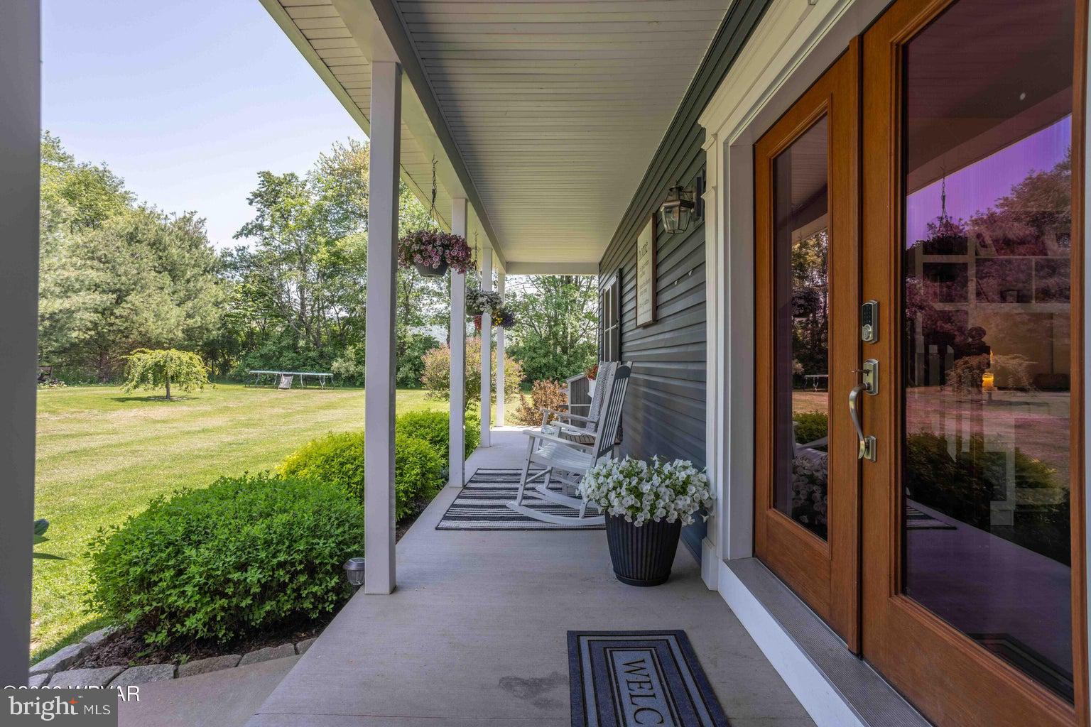 92 Easton Road Trout Run, PA 17771 - Photo 15 of 108 Charming porch with serene views.