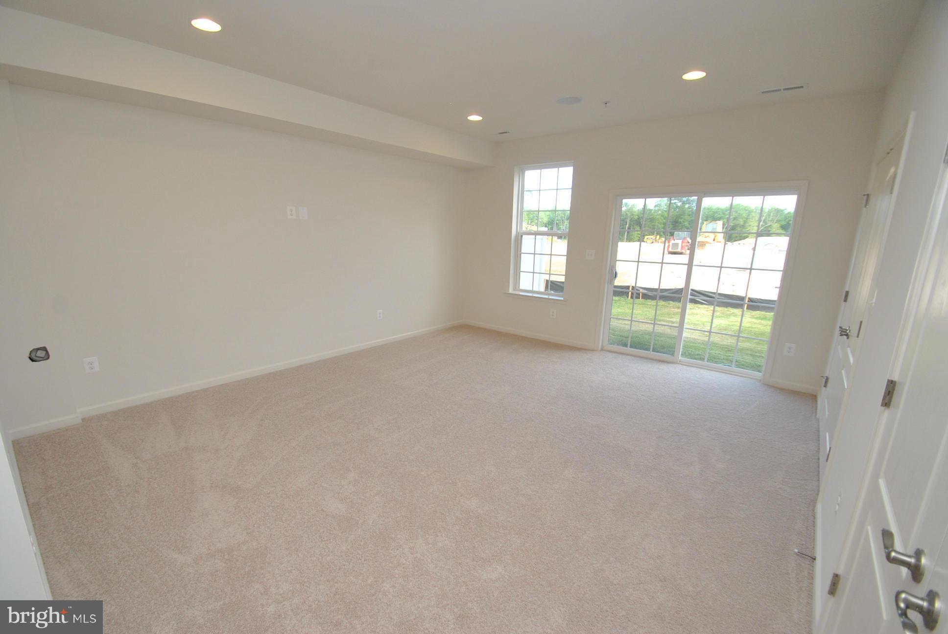 10416 Braddock Run Road Middle River, MD 21220 - Photo 4 of 20 a view of an empty room with a window