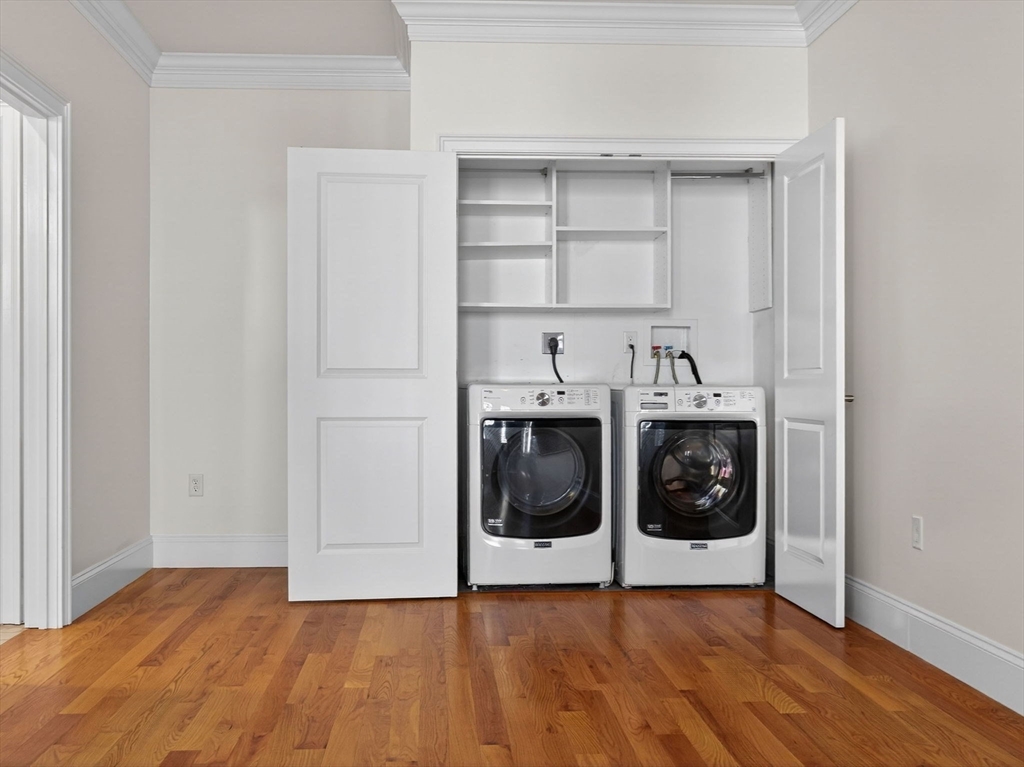 213 Lamartine Street, Unit 213A Boston, MA 02130 - Photo 29 of 39 a utility room with washer and dryer