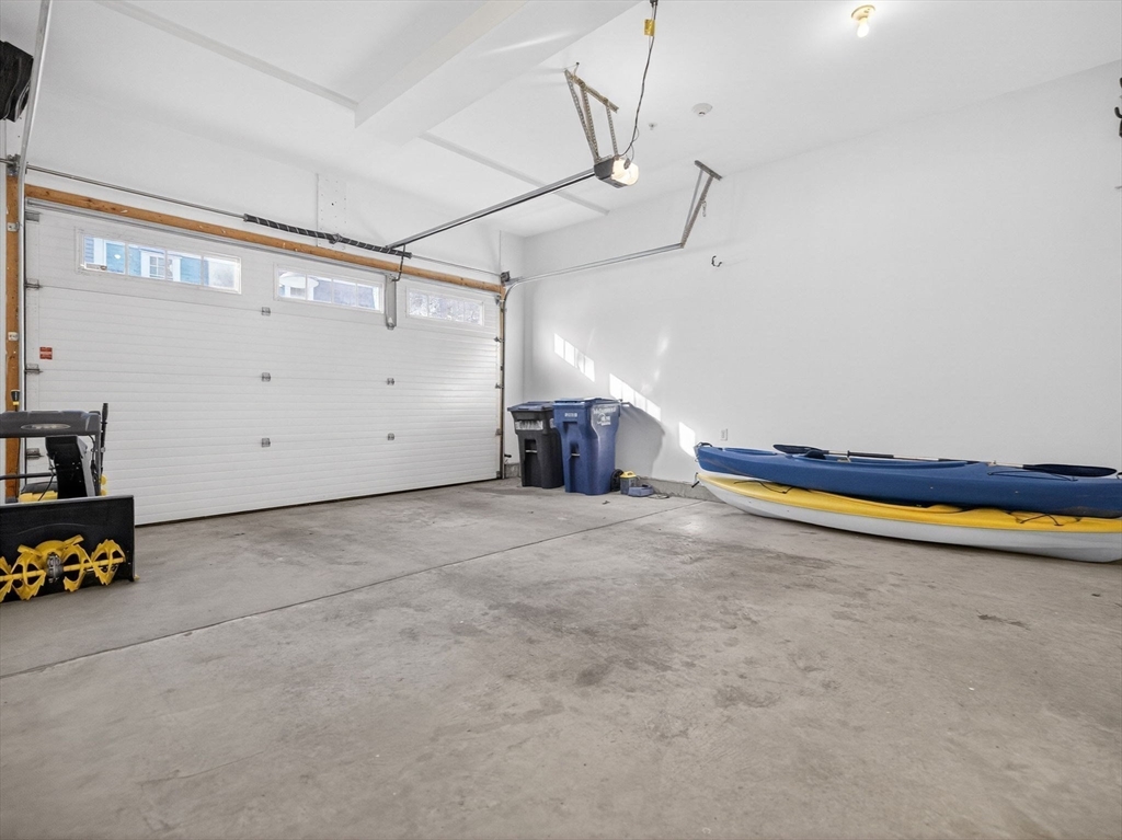 213 Lamartine Street, Unit 213A Boston, MA 02130 - Photo 30 of 39 a view of a room with gym equipment and a window