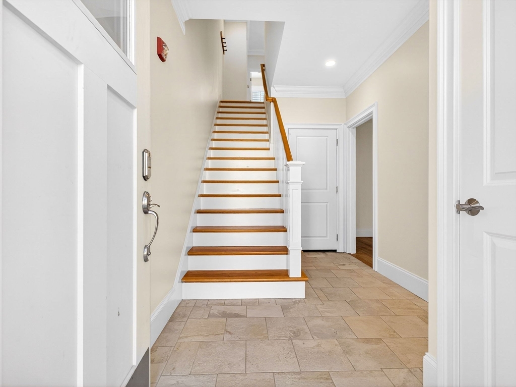 213 Lamartine Street, Unit 213A Boston, MA 02130 - Photo 31 of 39 a view of entryway and hall with wooden floor