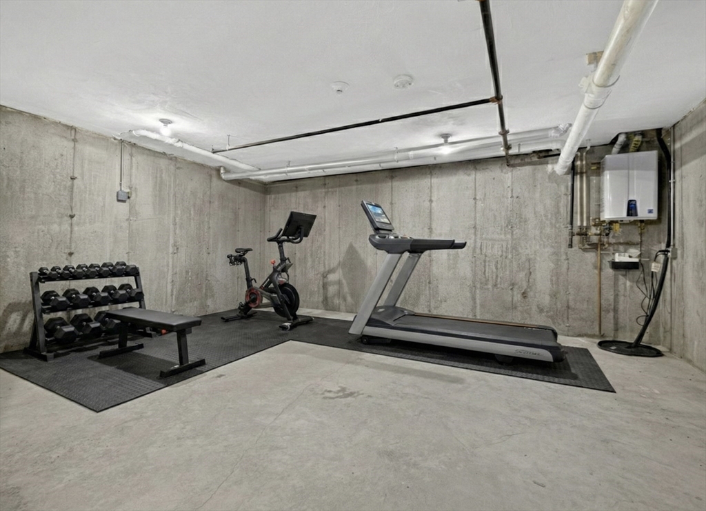 213 Lamartine Street, Unit 213A Boston, MA 02130 - Photo 32 of 39 a room with gym equipment and a window