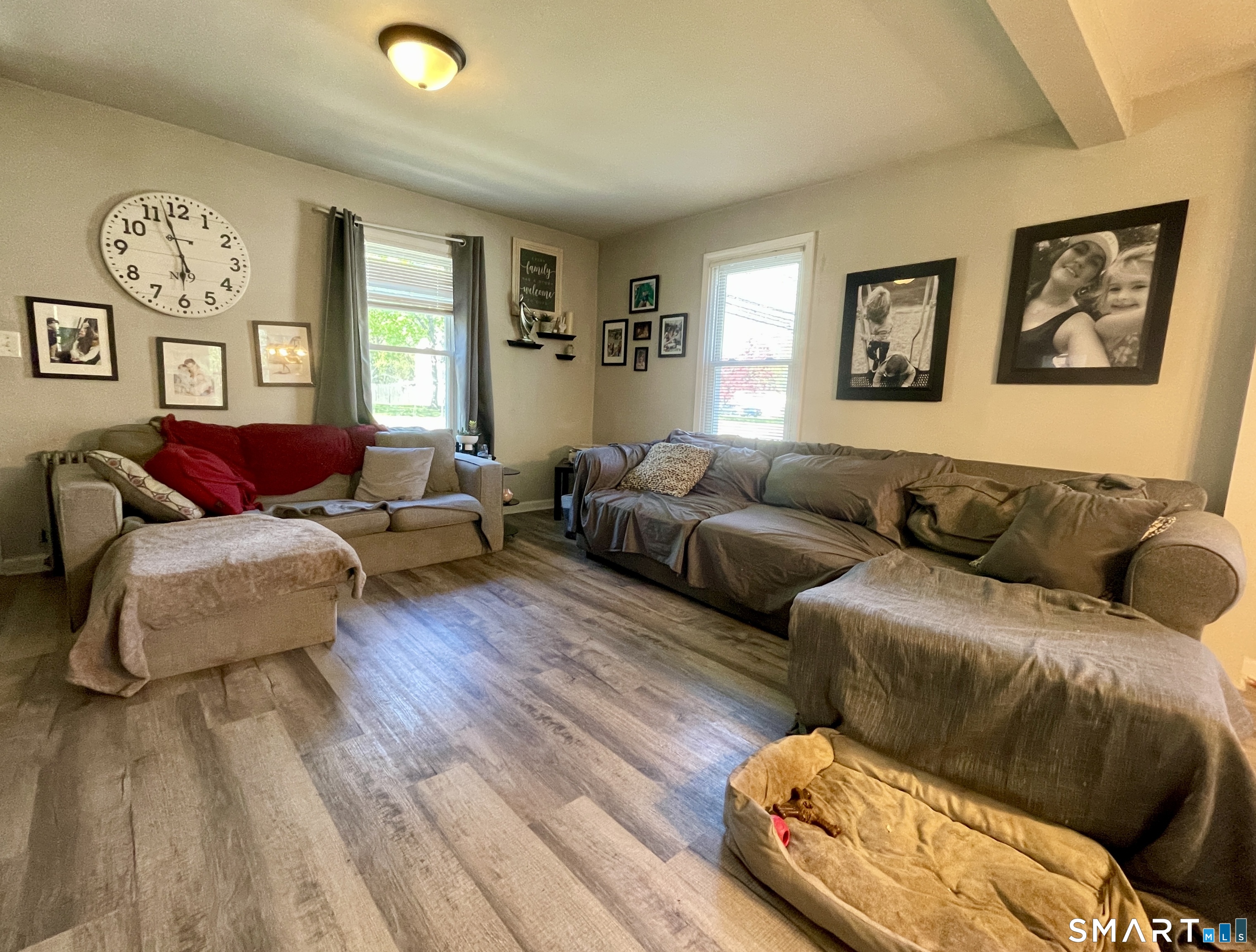16 Brainard Road Enfield, CT 06082 - Photo 15 of 32 a living room with furniture and a window