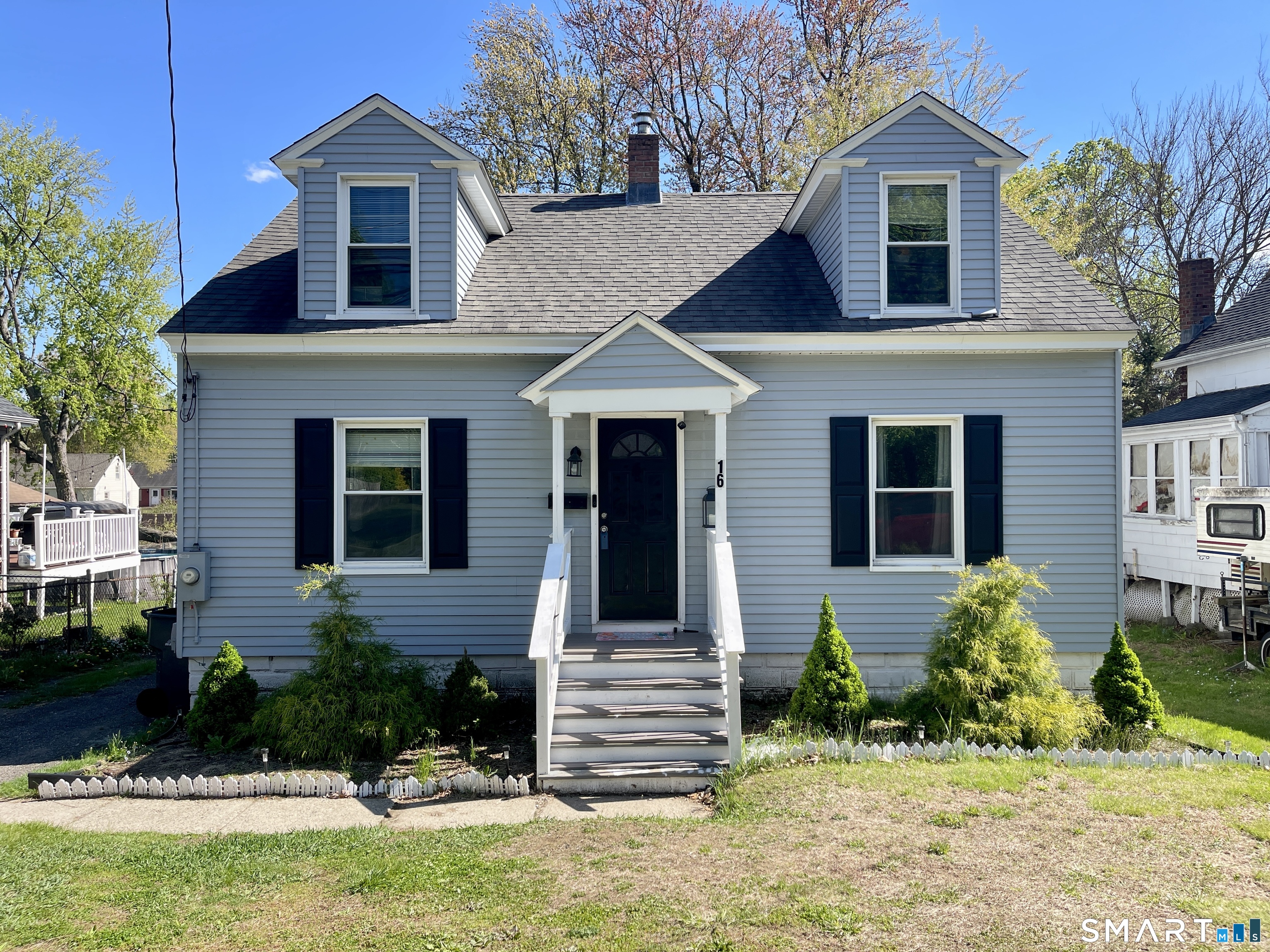 16 Brainard Road Enfield, CT 06082 - Photo 2 of 32 a front view of a house with a yard