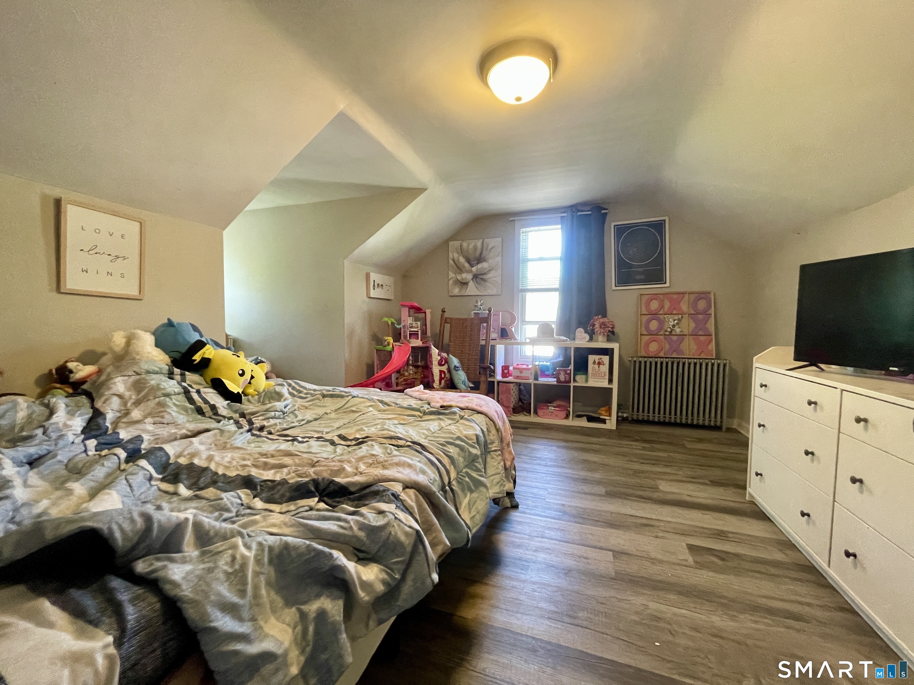 16 Brainard Road Enfield, CT 06082 - Photo 21 of 32 a bed room with a bed and a flat tv screen
