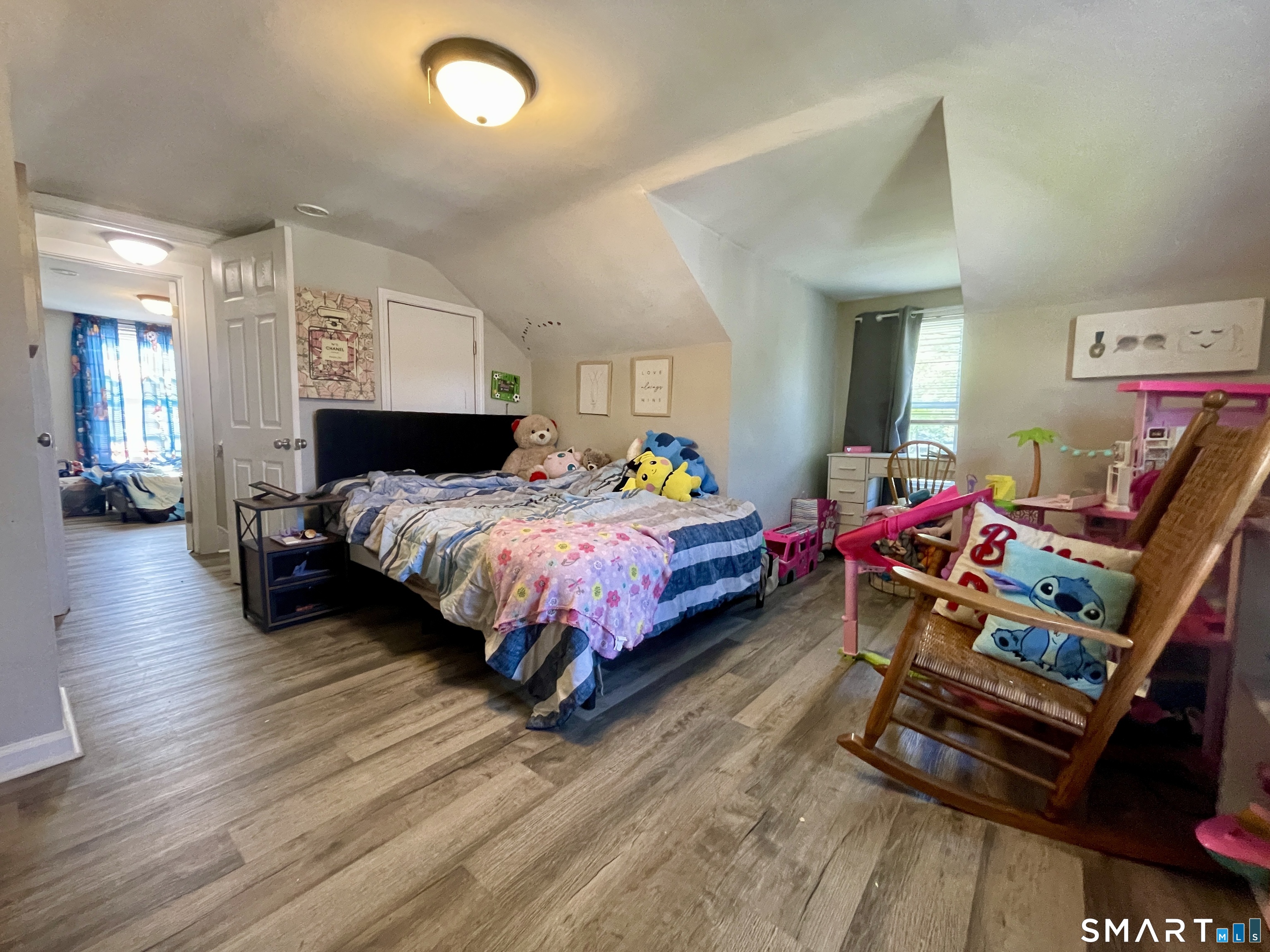 16 Brainard Road Enfield, CT 06082 - Photo 22 of 32 a bedroom with bed and a wooden floor