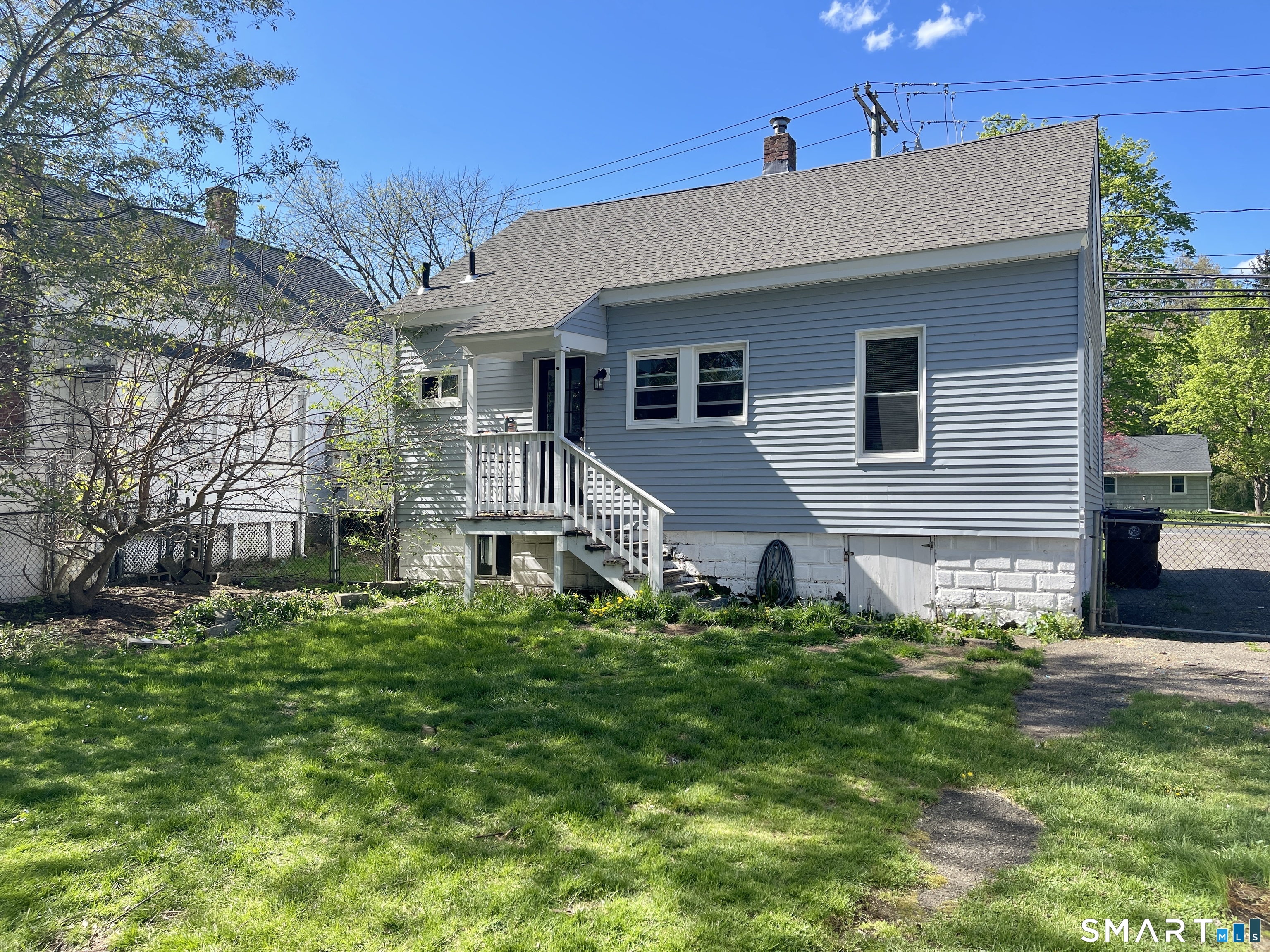 16 Brainard Road Enfield, CT 06082 - Photo 27 of 32 a front view of house with yard and green space