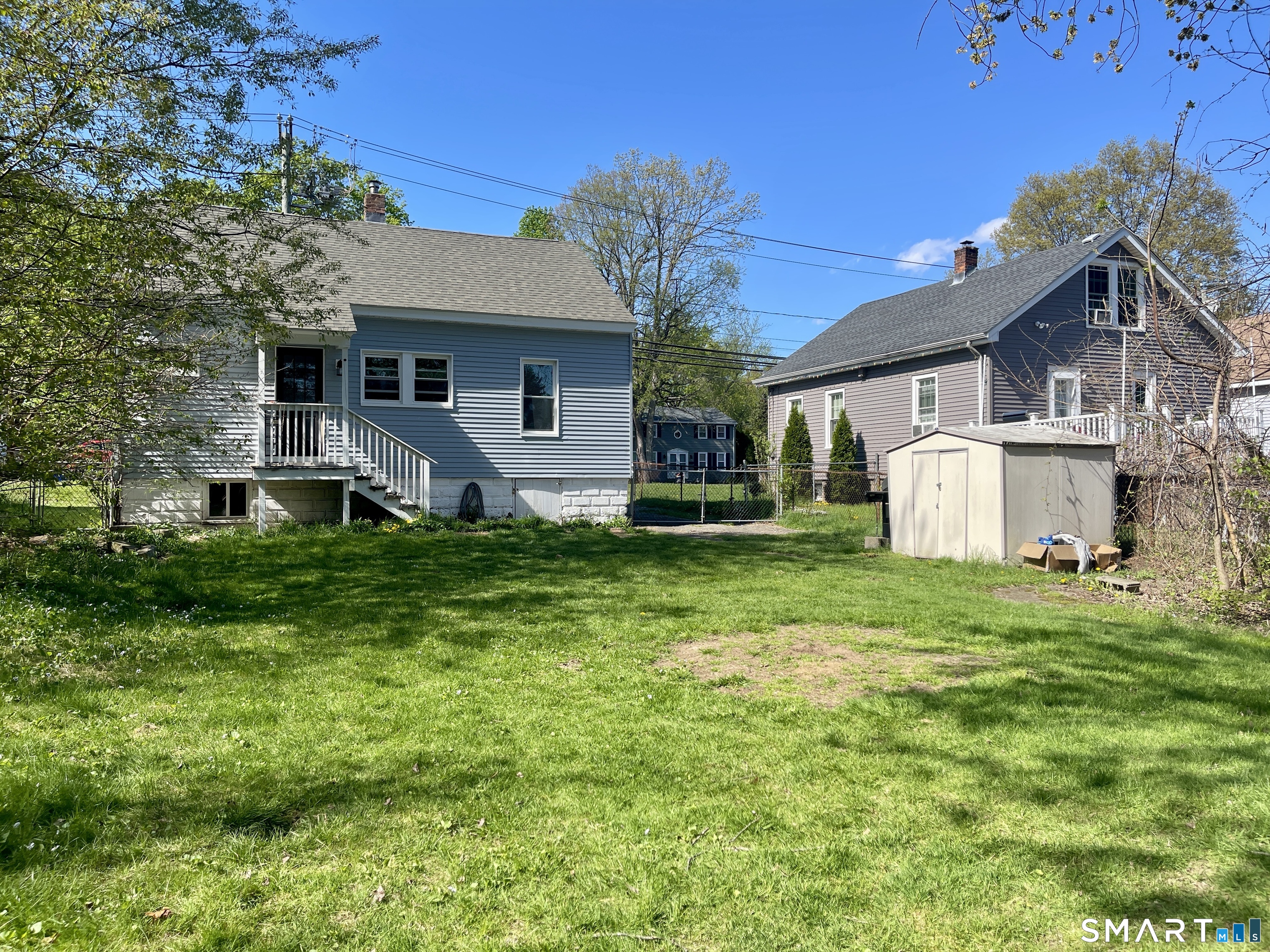 16 Brainard Road Enfield, CT 06082 - Photo 28 of 32 a front view of house with yard and green space