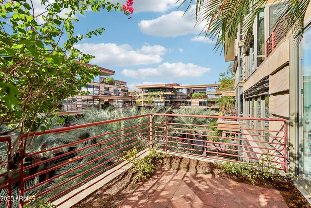 a bathroom with a shower and a toilet