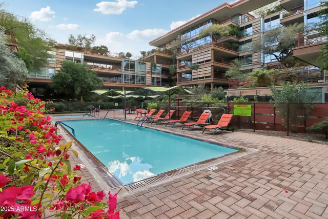 a view of a balcony with city view