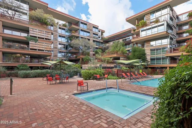 a front view of a building with retail shops