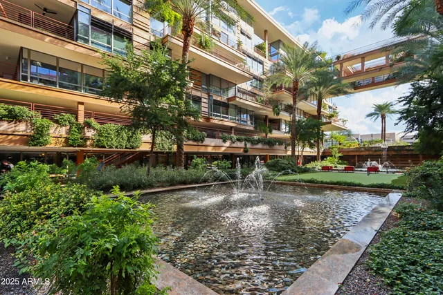 a view of swimming pool with a patio