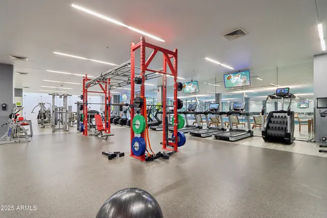 a view of a tall building with a large window