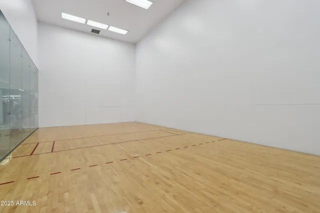 a view of a street with a building in the background