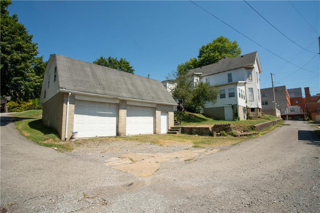 166 Pennsylvania Avenue Rochester, PA 15074 - Photo 28 of 30 a view of a house with patio