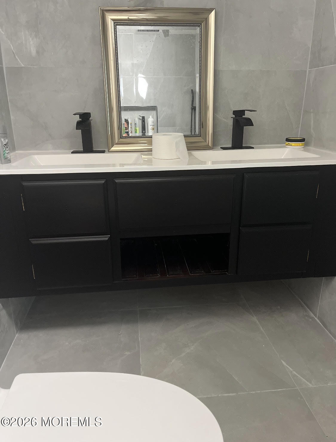 570 Eltone Road Jackson, NJ 08527 - Photo 16 of 37 a bathroom with a sink and a mirror