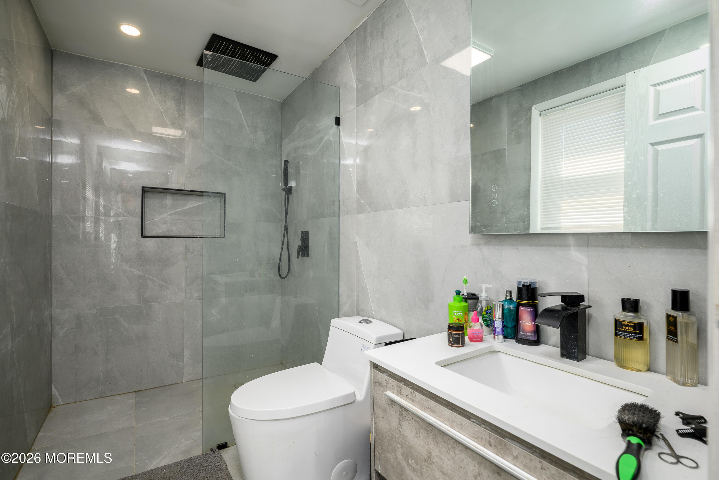 570 Eltone Road Jackson, NJ 08527 - Photo 22 of 37 a bathroom with a sink a toilet and shower