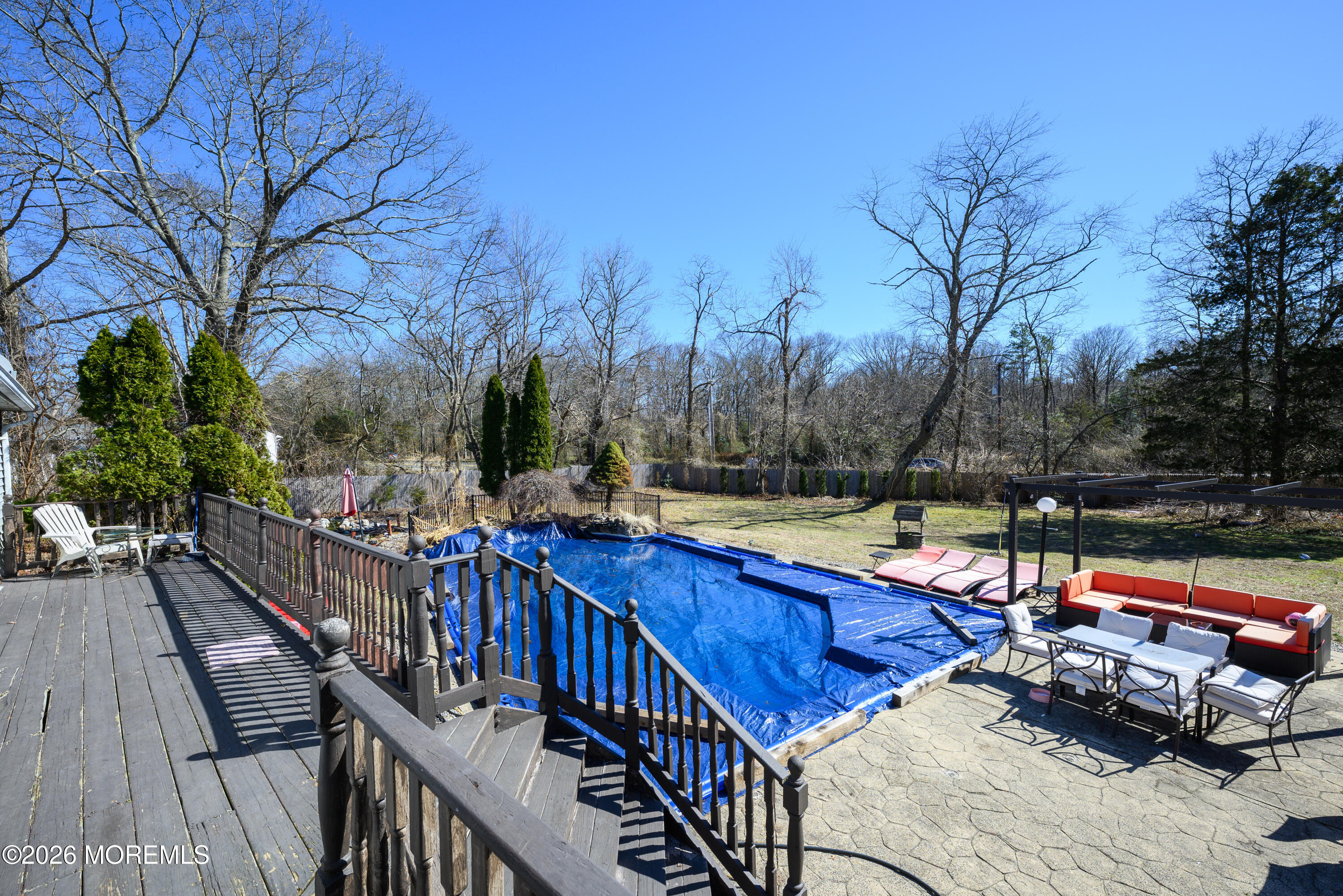 570 Eltone Road Jackson, NJ 08527 - Photo 28 of 37 a view of deck with chairs and wooden fence