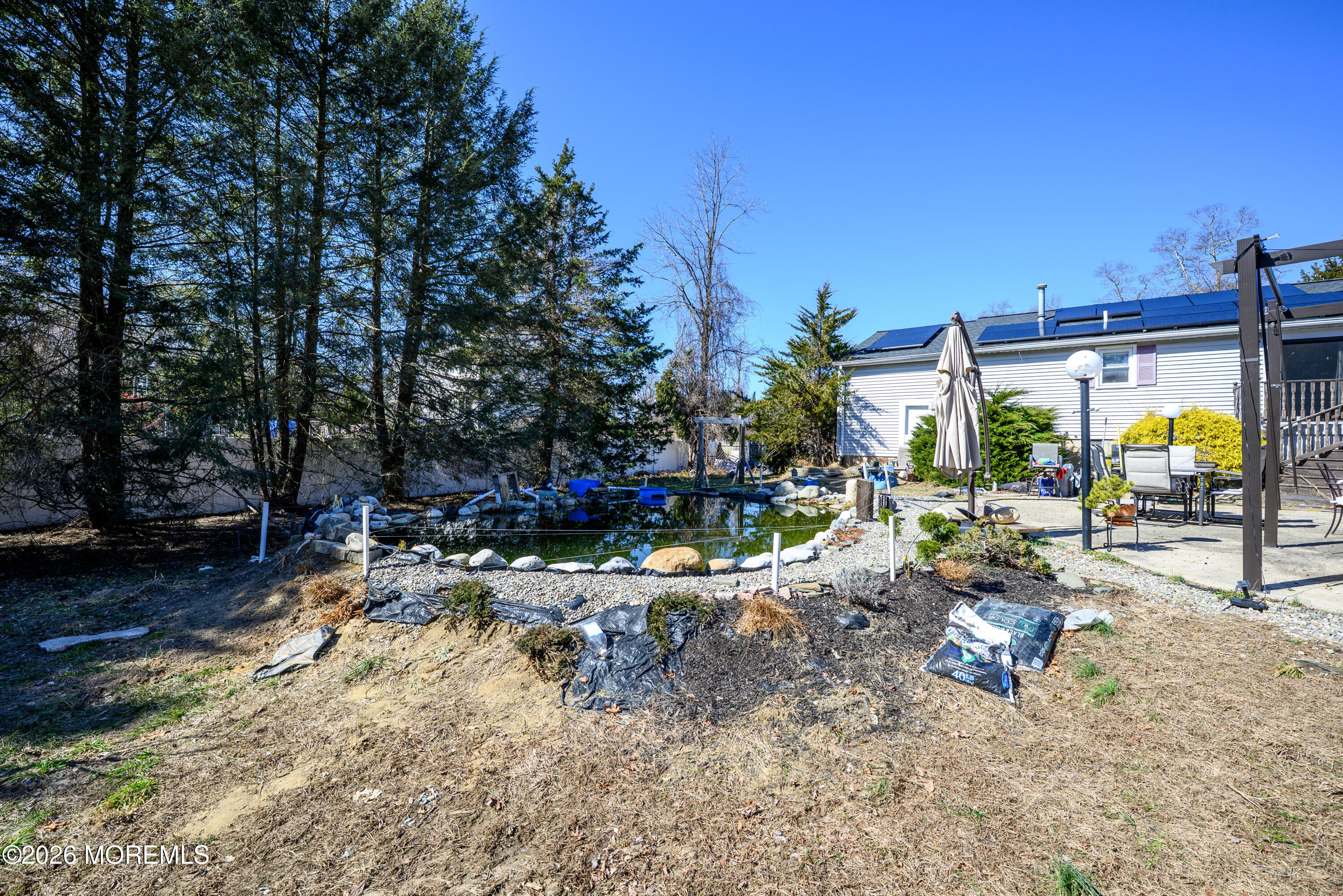 570 Eltone Road Jackson, NJ 08527 - Photo 33 of 37 a view of swimming pool with a patio