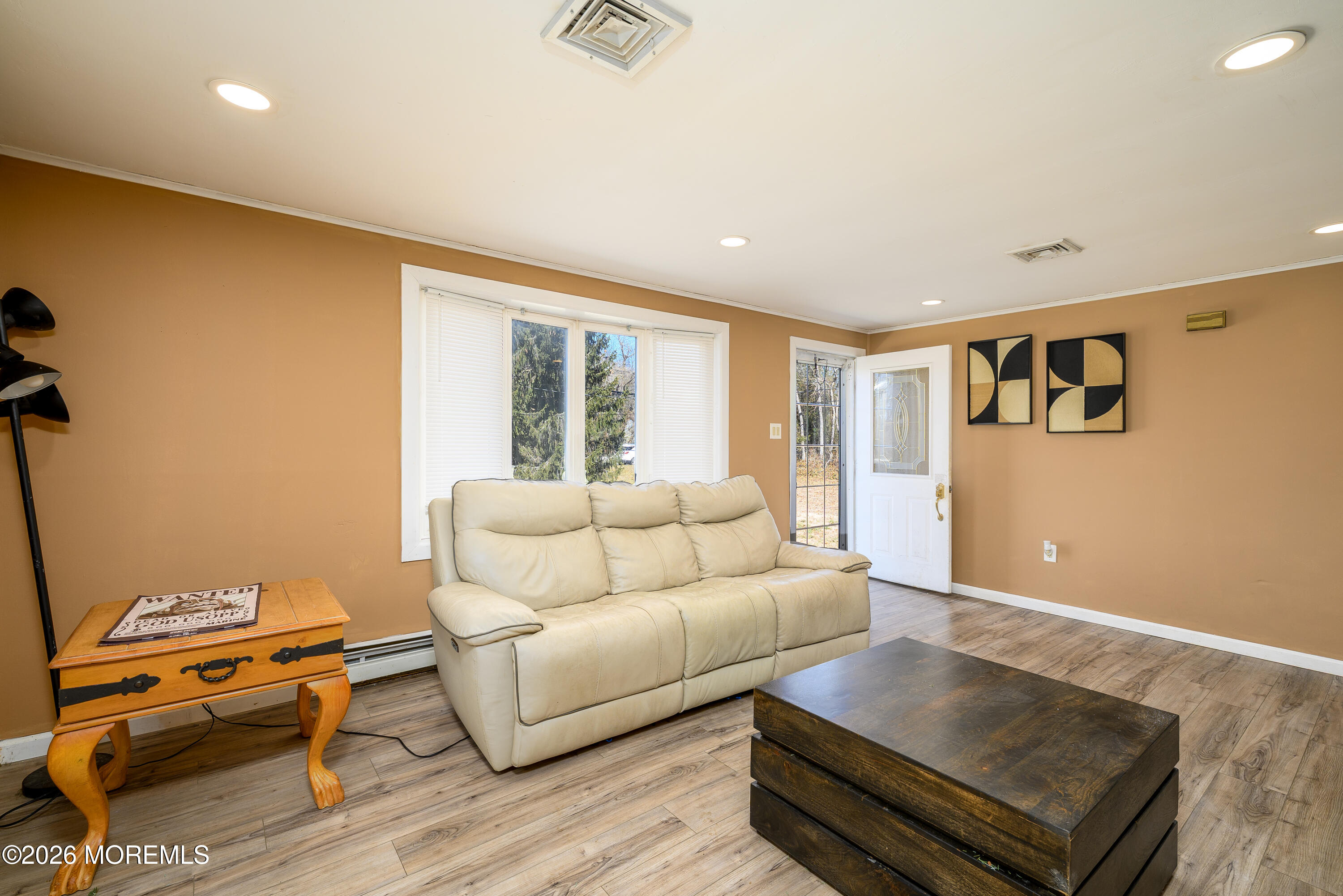 570 Eltone Road Jackson, NJ 08527 - Photo 8 of 37 a living room with furniture and a window