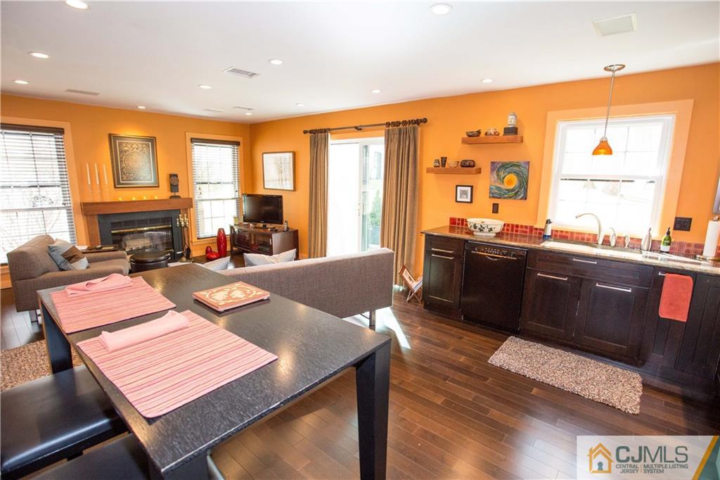 1301 Timber Oaks Road, Unit 1301 Edison, NJ 08820 - Photo 9 of 25 a view of a dining room with furniture window and wooden floor