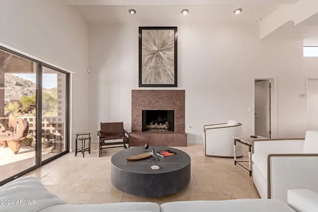 a kitchen with stainless steel appliances kitchen island granite countertop a sink and cabinets