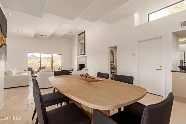 a spacious bedroom with a bed and a couch