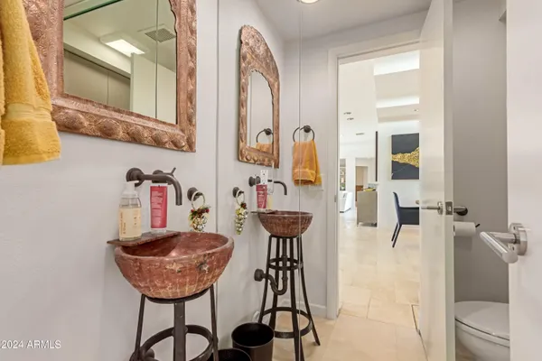 a bathroom with a sink tub and shower