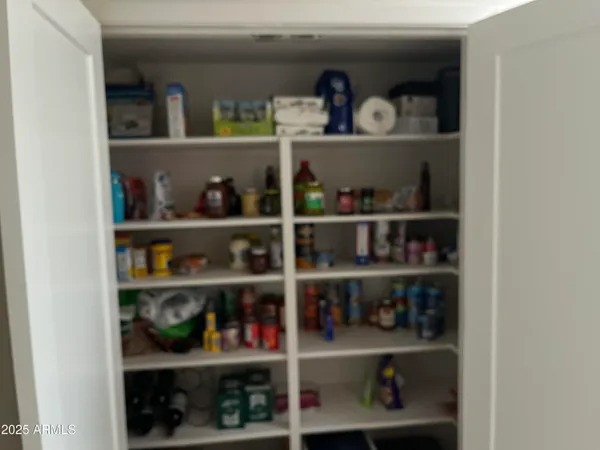 a outdoor living space with furniture and a fireplace