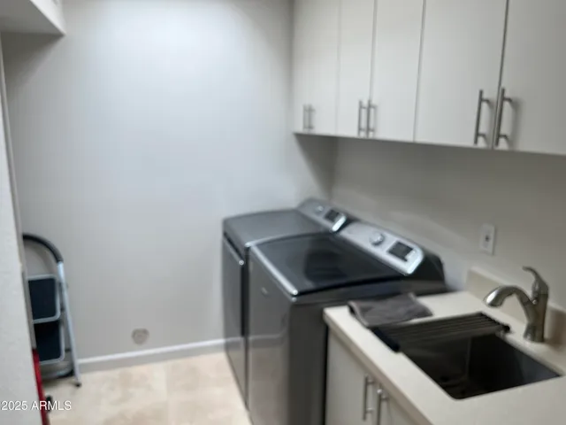 a view of sitting area with furniture and wooden floor