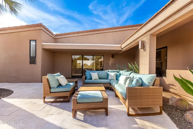 a view of a swimming pool with a lounge chair