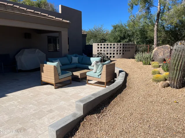 a view of a swimming pool with a lounge chair