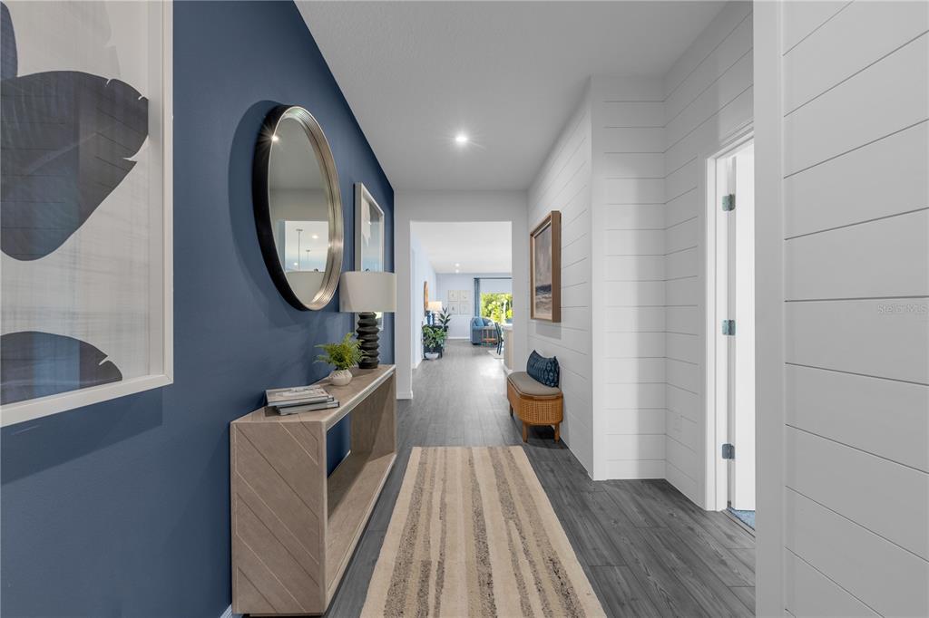 933 Pearlwood Loop Bartow, FL 33830 - Photo 2 of 39 a view of a living room and dining room